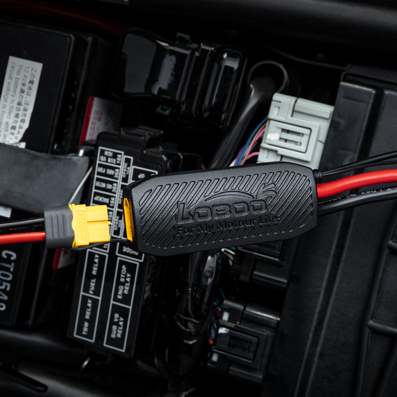Centralina montata nel vano batteria di una moto