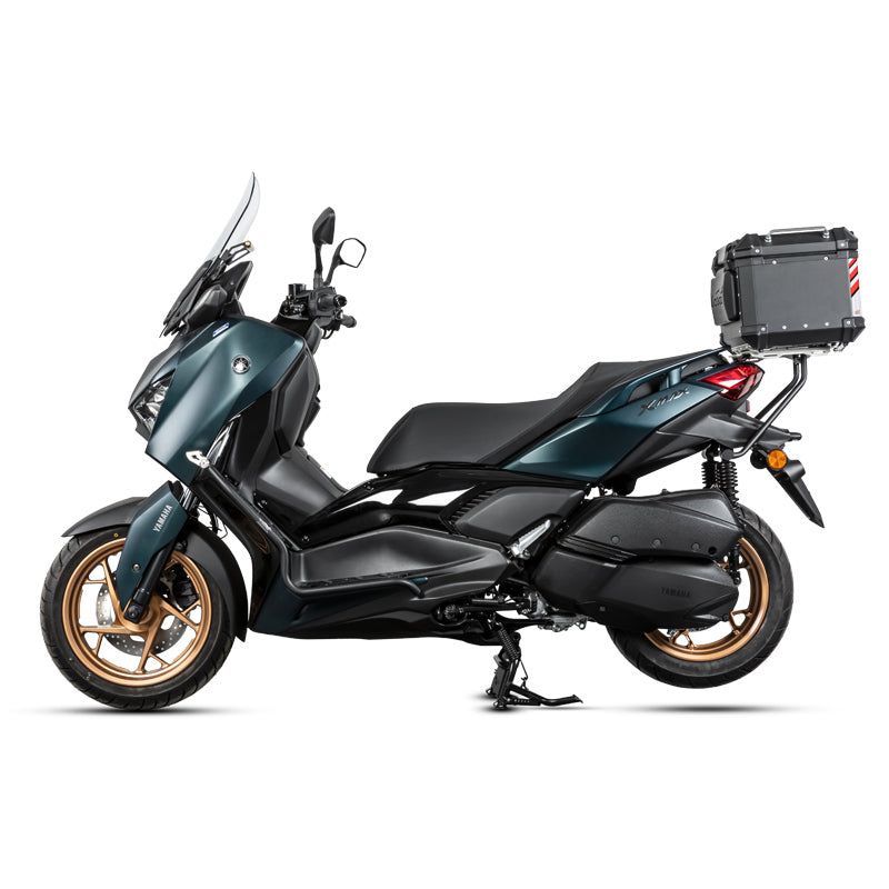 Yamaha XMAX 300 verde senza crash bar, vista laterale di riferimento