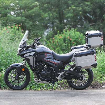 Crash bar LOBOO CHG281 montato sulla Honda CB400X, vista laterale sinistra su sterrato